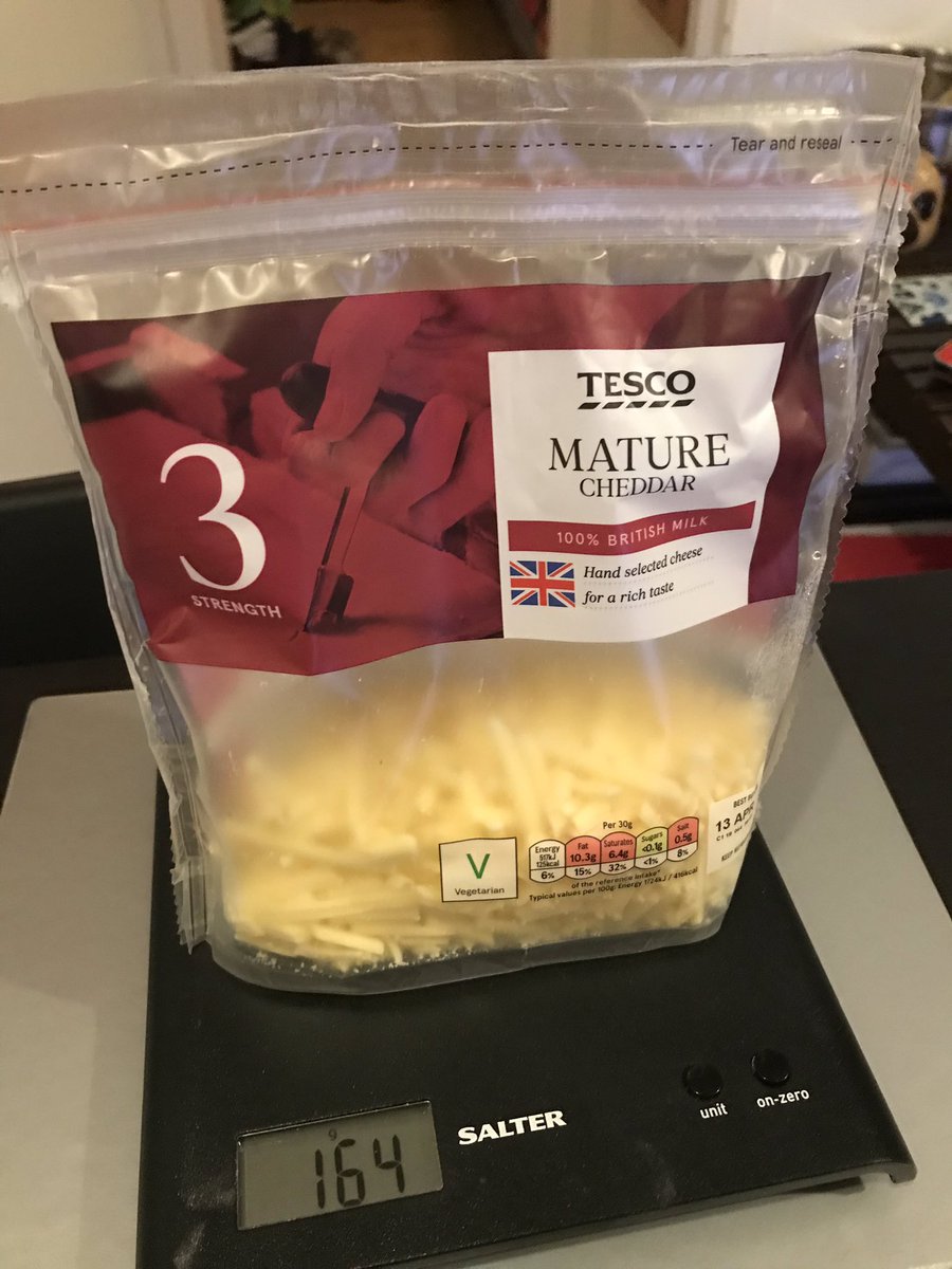 IkkinMaharg's tweet photo. Ordered some @Tesco pre-grated cheddar in my online shop this week. Packet says 250g. Scales say 164g. #costofbrexit? #whereismycheese? (Seal still in tact!) https://t.co/PFDpW4NJN7