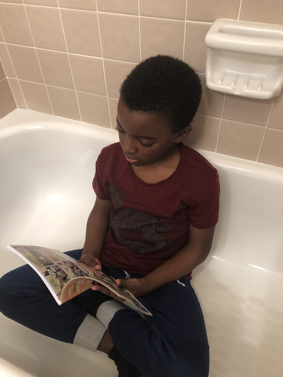 Pebblesrock1's tweet photo. EJ got caught reading in a new place...THE TUB!! 😍☺️ @GETCHEROKEEREADING @bascombbobcats #CCSDkidsRead #ccsdreads #bascombkidsread https://t.co/QHmsCOYs9L