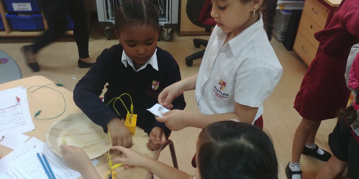 Year 2 students making their own switches in science. Working together to test materials and make the circuit work. Well done! #problemsolver