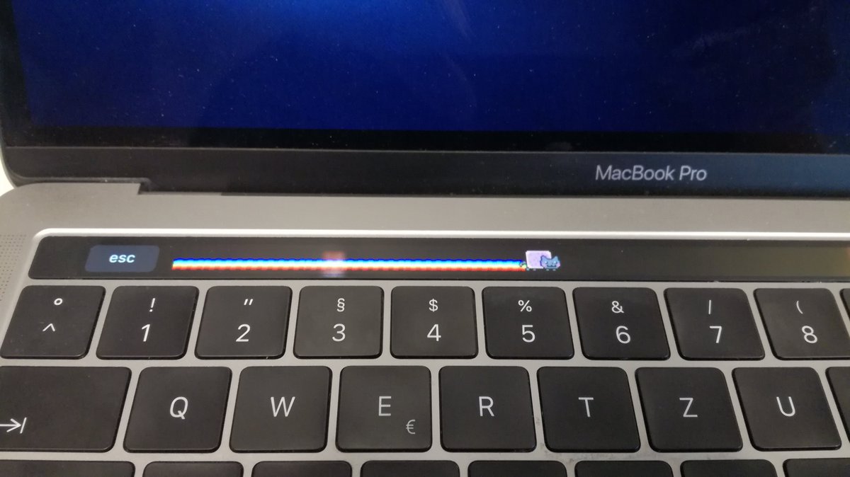 cloud_dev_'s tweet image. For anyone wondering what the touchbar on the #MacBookPro is actually for. #nyancat