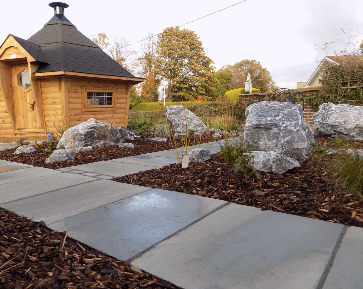 CEDStoneGroup's tweet photo. A beautiful garden transformation from last year by @jamesridleygar1 using our Indian Grey Sandstone Paving [https://t.co/XoIu1mhUDO] and Smokey Grey Limestone Rockery, this will look fantastic when the planting has grown. https://t.co/JAX5oiTucE #LovePaving https://t.co/o8hJMmaBlR