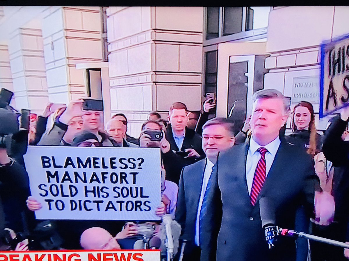 iamLucretiaMott's tweet photo. Thank you to the protester with the signs next to the “attorney “. We see you. #ManafortSentence #PutinsMafiaWillNotWin https://t.co/I5tx0t5Lo2