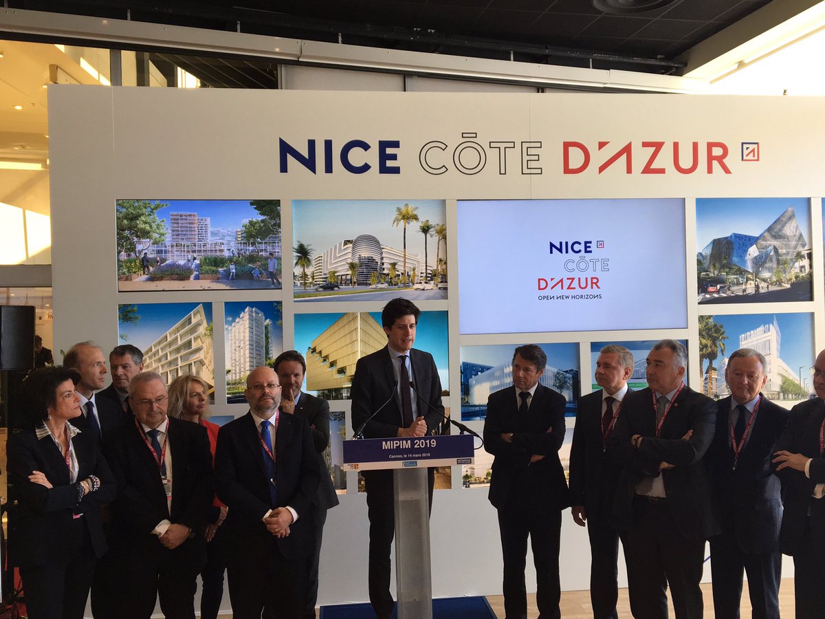 EPA_EcoVallee's tweet photo. .@J_Denormandie rend visite au stand @MetropoleNCA et @EPA_EcoVallee au @MIPIMWorld  et salue les projets menés sur le territoire https://t.co/79VfUOkJEf