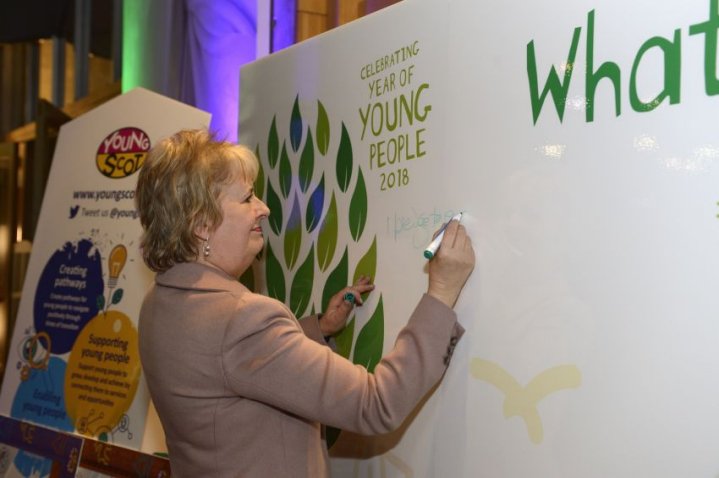 NatureScot's tweet photo. During our parliamentary reception for #YOYP18 MSPs used our pledge wall to make commitments to help young people. @JennyGilruth has held a pupil surgery in every high school she represents, giving her "one of the most valuable experiences of 2018"😃 #connectingpeopleandnature https://t.co/ZST9tdIDlj