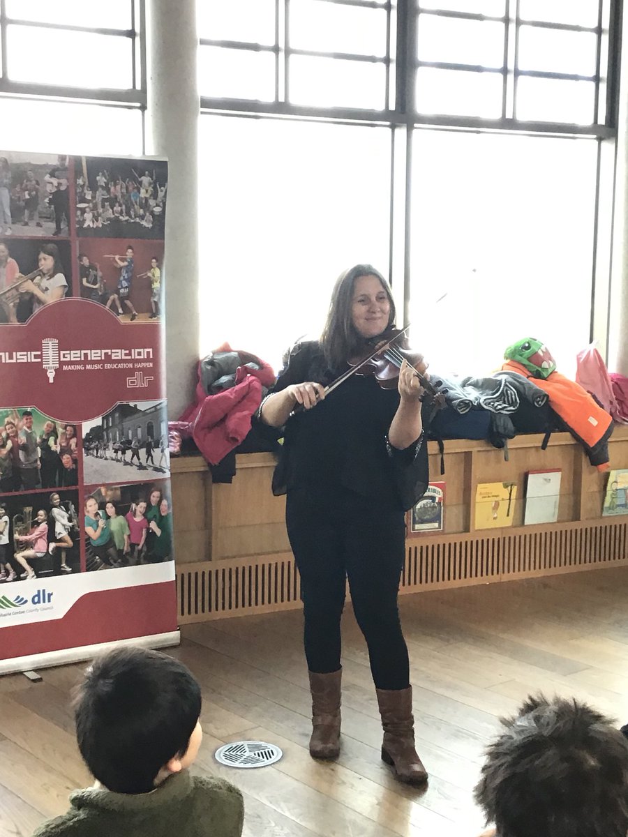 DLR_Libraries's tweet photo. Violinist Lynda O’Connor with @MusicGendlr wowing schoolkids this morning in @dlrLexIcon. She’ll be back at 3pm on level 4 for an open session of “Try an Instrument” All welcome, no booking required. #musicfun #fiddleplaying #libraryfun https://t.co/omLfTh2wVk