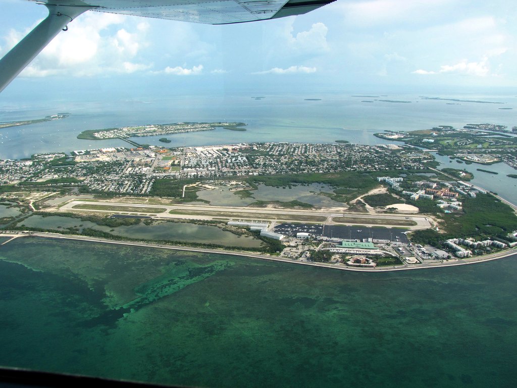 BlueMarlinMotel's tweet photo. It's easy to forget how small #KeyWest is until you see it from WAY up high! We love this shot! #bluemarlinmotel #bluemarlinkeywest #thatwaterthough #paradise https://t.co/xNB02So27j