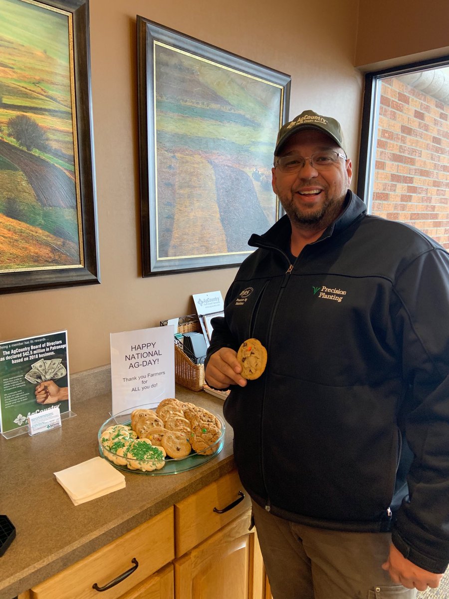 AgCArlene's tweet photo. Cookies for our Farmers!  Dustin M. Thanks for posing!  #NationalAgDay #AgCountryProud #AgDay19 https://t.co/9a1A070ctP
