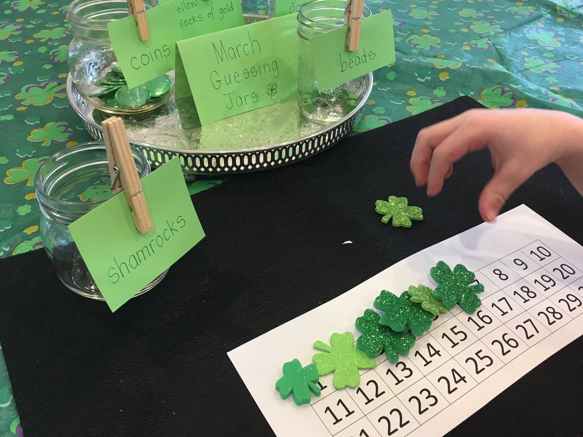 exploring_k's tweet image. Beginning our morning with March Guessing Jars! Thank you @McLennan1977 for the inspiration! Lots of wonderful math talk as we estimate, count and record how many objects are in the jars. @hspaulLRSD #joyfulmath #playbasedlearning