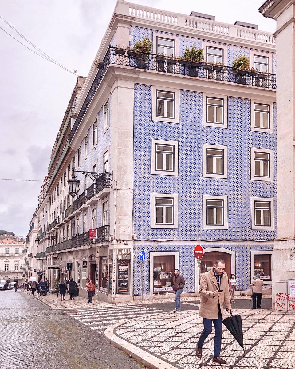 The extraordinary Chiado neighbourhood with its beautiful buildings from the 18th century.

The one in the photo has the oldest bookstore in the world, opened since 1732.

#VisitLisboa 
Photo by malyulka