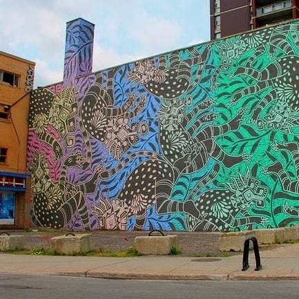 SWorldTraveller's tweet photo. Incredible art in Montreal. We've seen several buildings covered in it. I think it's art. Do you?

#travelphotography #travel #travelgram https://t.co/BxqHuFE6a1 https://t.co/lkcwvIO2nv