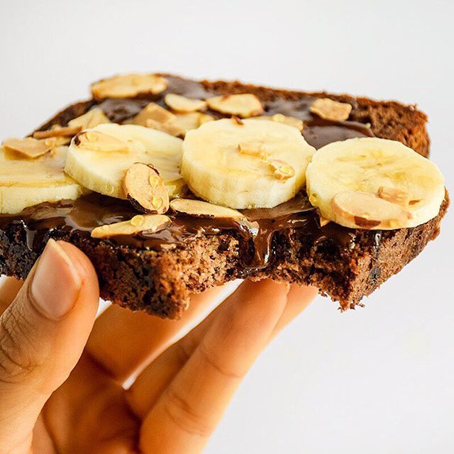 Enjoying a thick slice of almond-flour bread with a generous smear of <a href="/phatfudge/">Phat Fudge</a>, sliced banana, and toasted almonds. Afternoon slump? Hardly.🙃#eatplaycrush
.
.
.
#phatfudge #paleo #ketogenic #keto #ketodiet #lowcarb #lchf #fuelwithfat #healthylifest… ift.tt/2HlwSkX