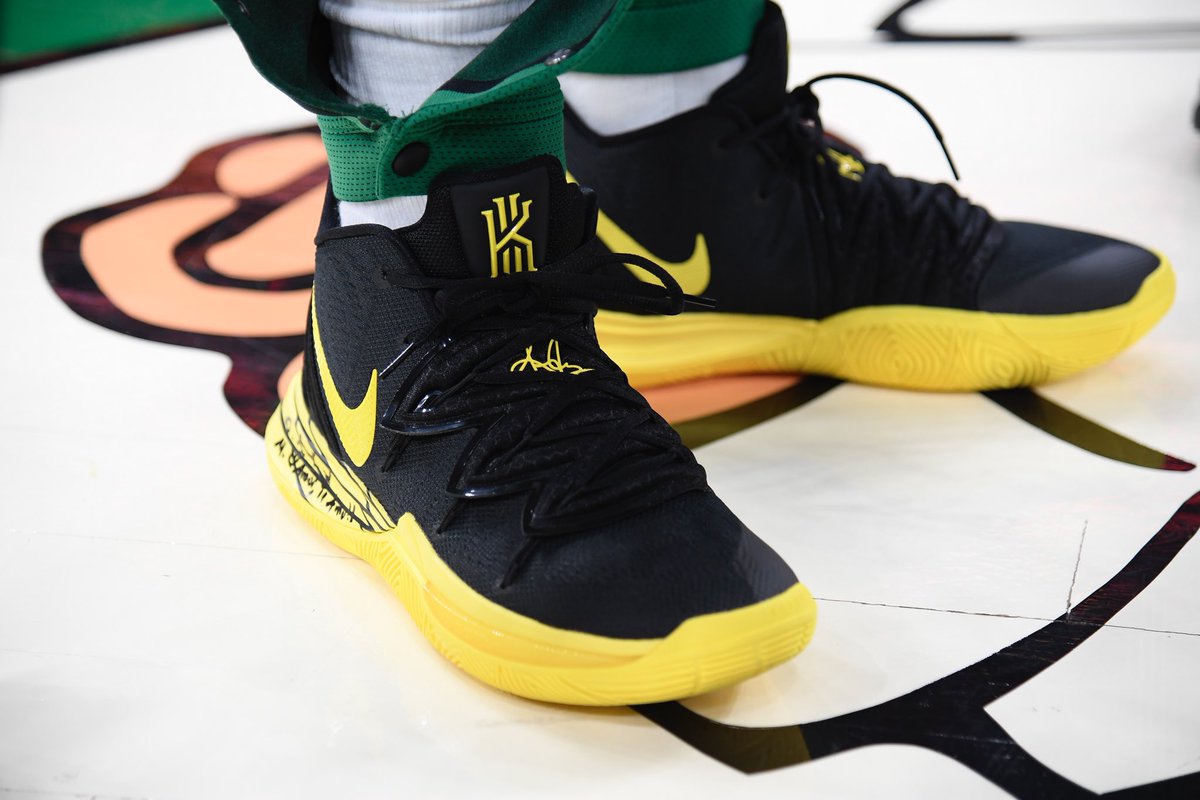 kyrie irving shoes black and yellow