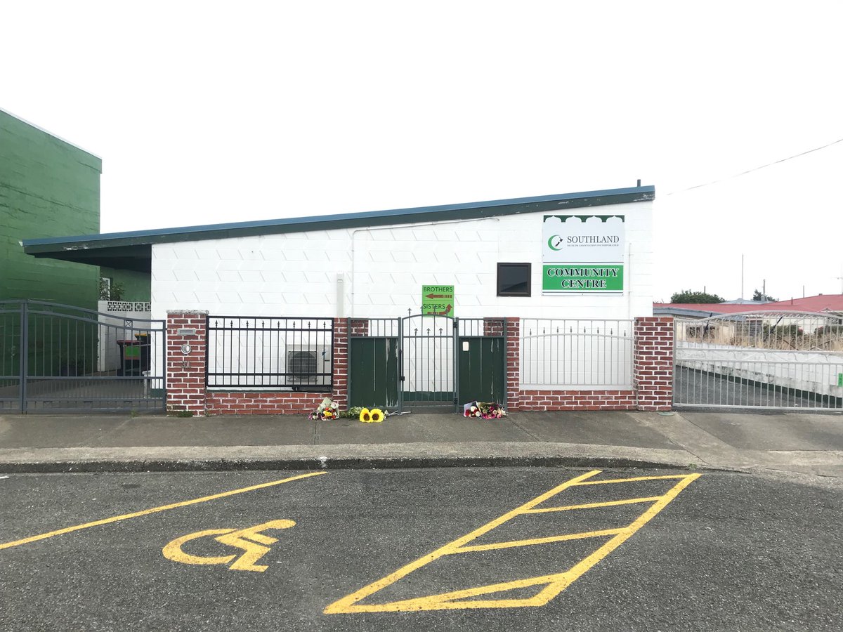 chrislarsonf's tweet photo. Worlds southern most mosque - Invercargill - flowers already placed. It’s deserted apart from a police van with two guys inside with guns. https://t.co/wQRvWmKsc9