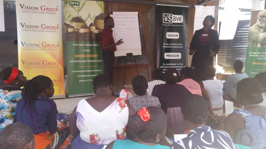 VisionGroup's tweet photo. [PHOTOS]: Joseph Kaggwa (Treasurer) &amp; Dorothy Mwesigwa (Admin. Exec) from @ysaveorg, addressing challenges affecting the self-help groups and solutions to improving their saving culture, how to grow and constructively use/invest of their savings.
#VGCSR #BalanceforBetter #IWD2019 https://t.co/xwfPrMw4GT