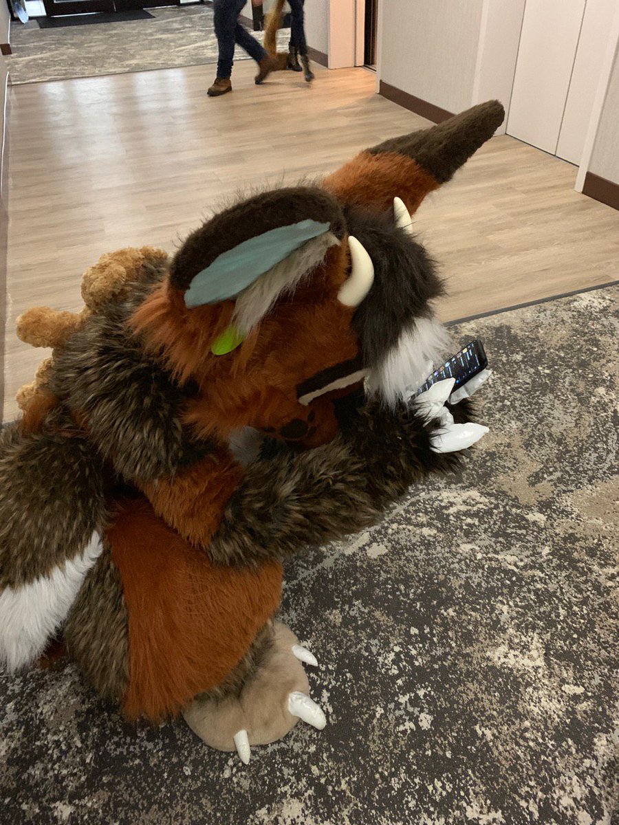 FenwickFluff's tweet photo. @Fenwickfluff has a very hard time taking and posting selfies for everyone due to his big ears and claws.

But he is trying his best!

#MulticolorBark #FursuitFriday https://t.co/Qa110a68xI