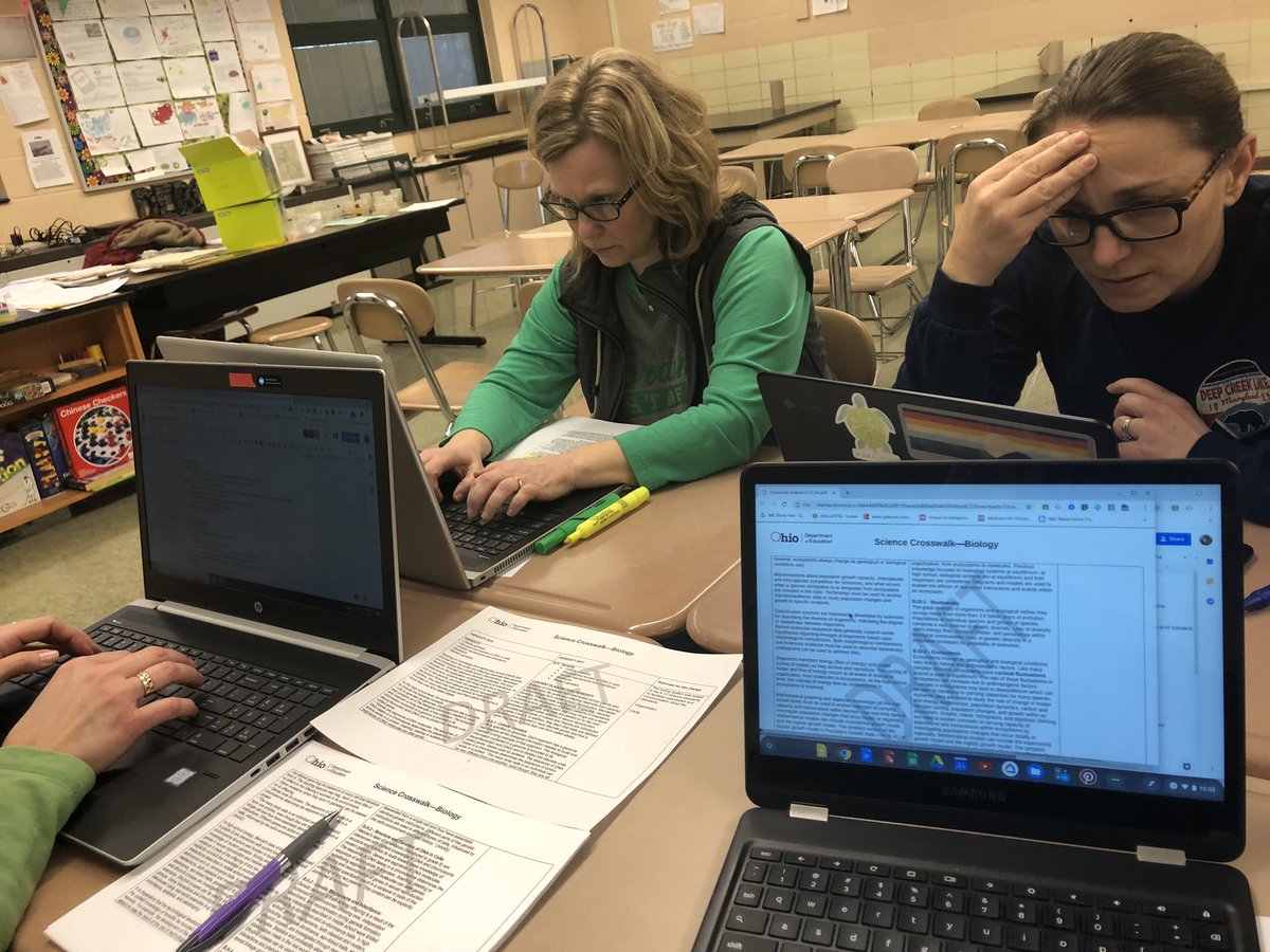 SandvickScience's tweet photo. Biology teachers breaking down the new standard changes in crosswalk packets! @CaseyGWright @DrJoeClark https://t.co/iC09Sqm3sS