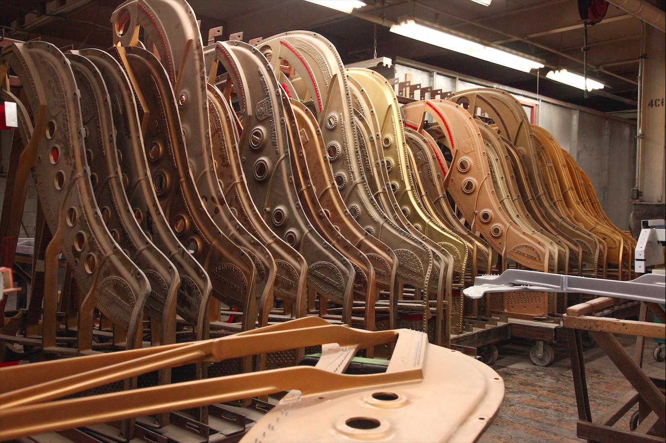 The #Steinway cast iron plate provides strength and stability as 20 tons of string tension is continuously exerted on the piano. We use a "bell-quality" casting, to support string tension, reduce vibrations, and improve the overall sound of the piano. #SteinwayFactoryFriday