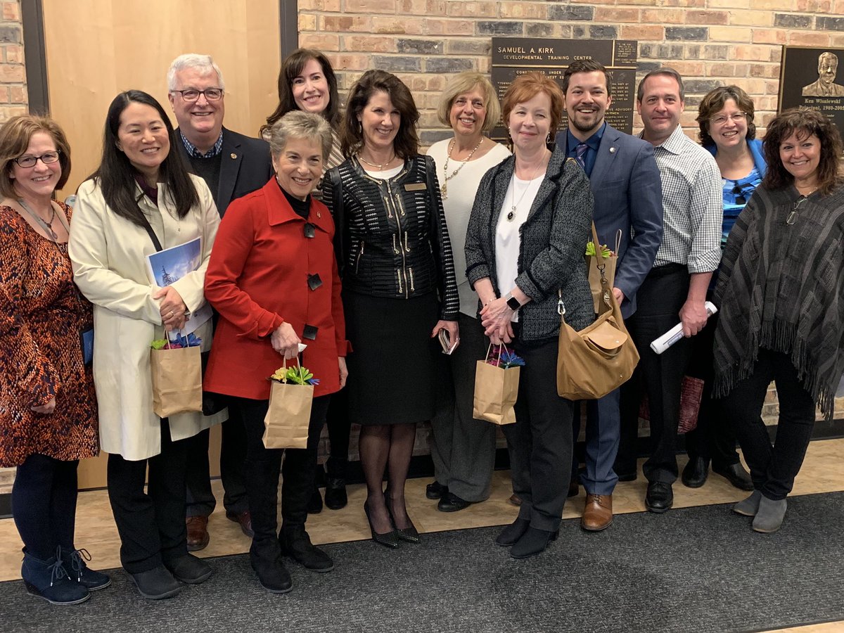 The group of Legislators and community leaders posing at Kirk School