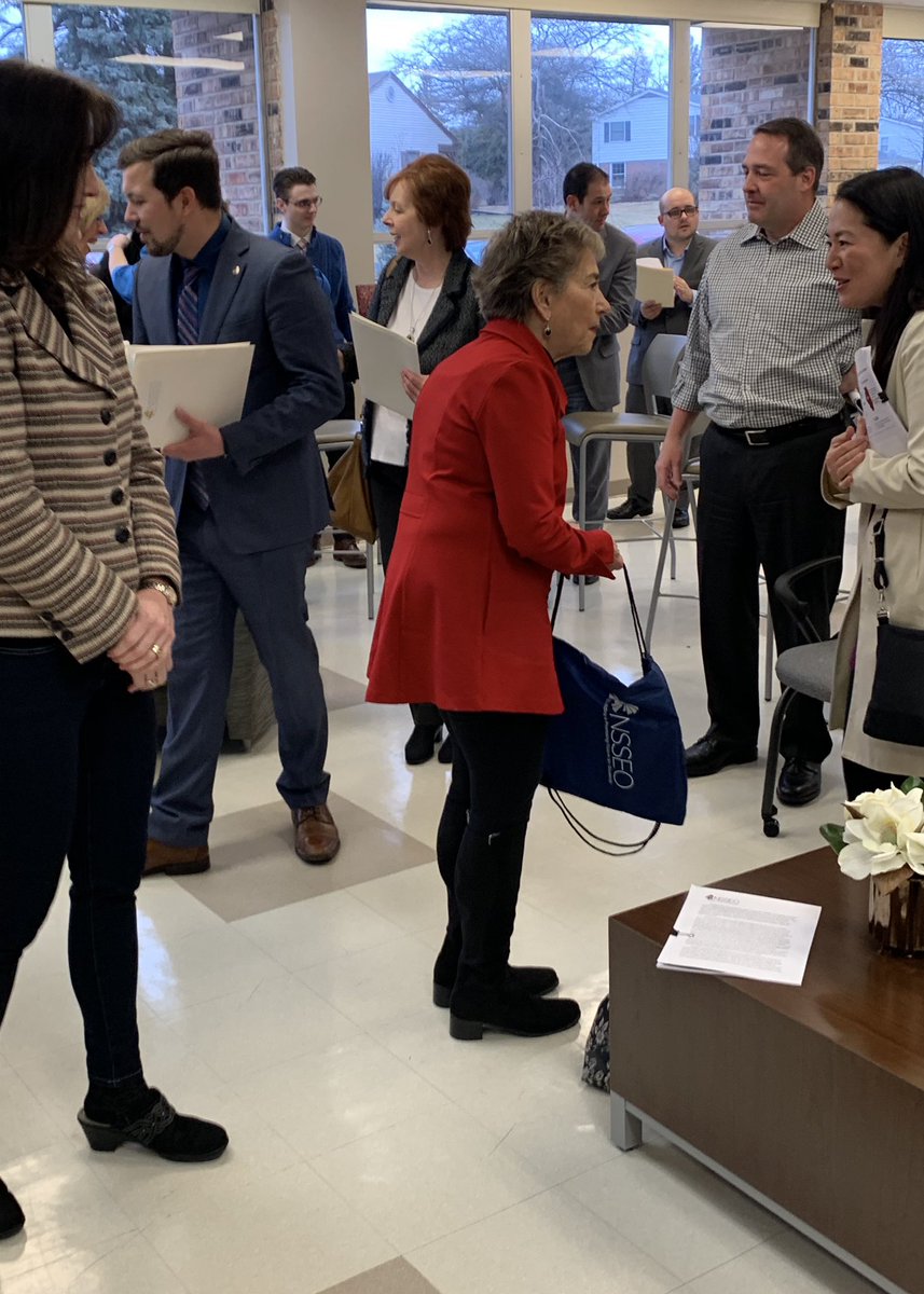 Legislators and community leaders talk with NSSEO Governing Board members, parents, and administrators