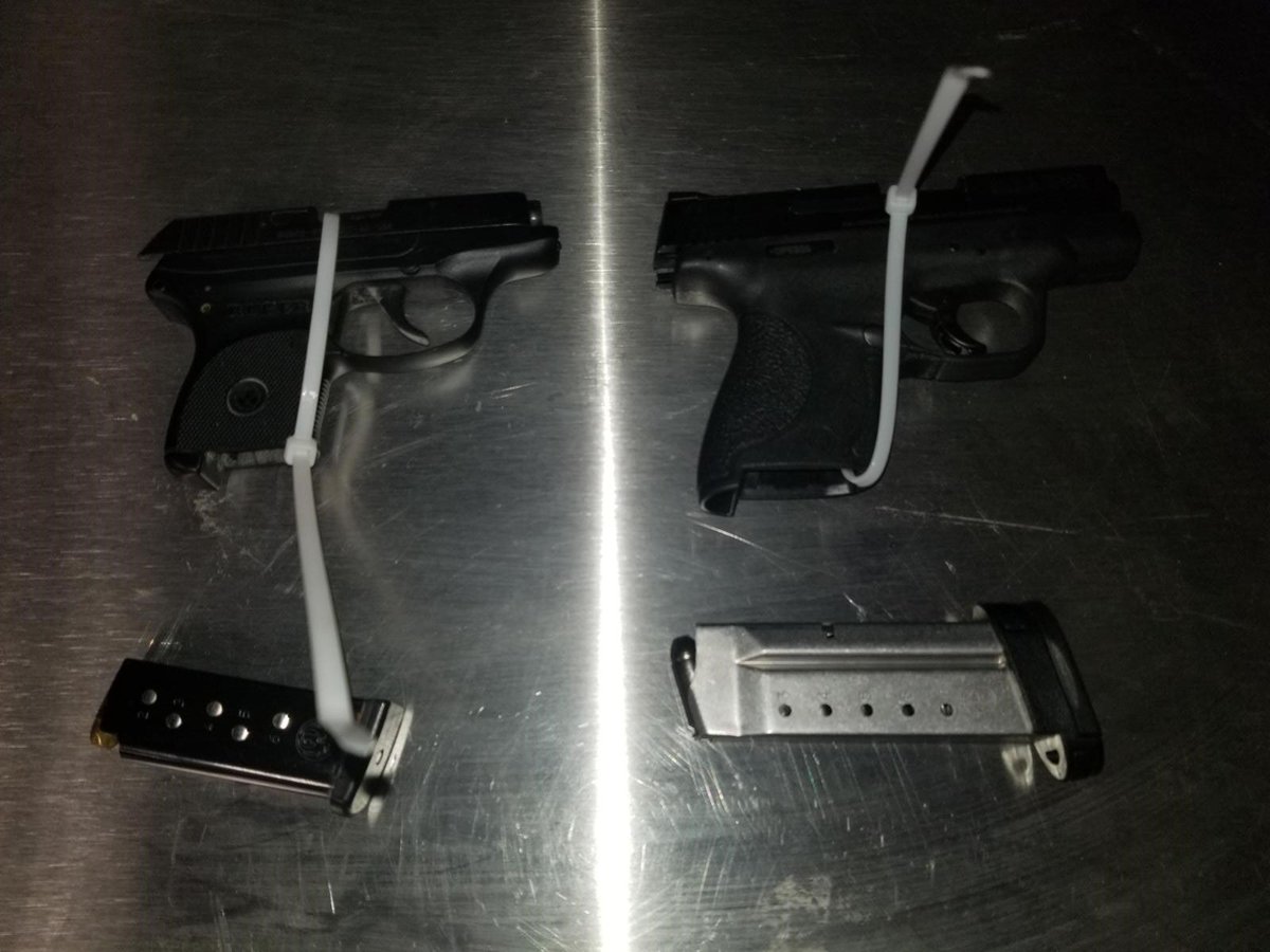 CBSANOR's tweet photo. #CBSA Officers found these two firearms in a traveller’s vehicle at #Lansdowne. He was penalized a hefty $2,000 and refused entry to Canada. #CBSABust #LeaveYourGunsAtHome https://t.co/ZK2tRgUlTN