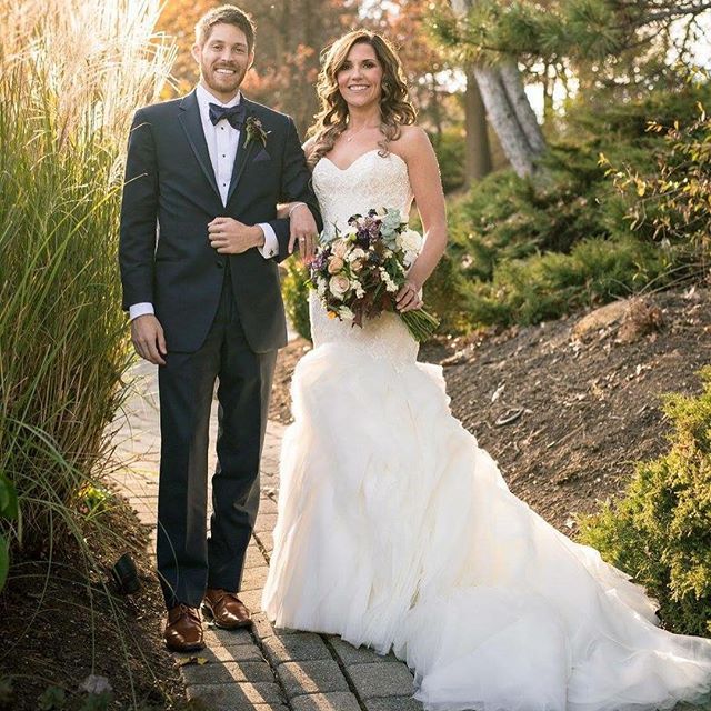 Jess looked stunning in both of her beautiful bridal looks. That ruffle bottom @maggiesotterodesigns is modern and playful, while the lace <a href="/justinalexander/">Justin Alexander</a> style is traditional and romantic - what a perfect combination!