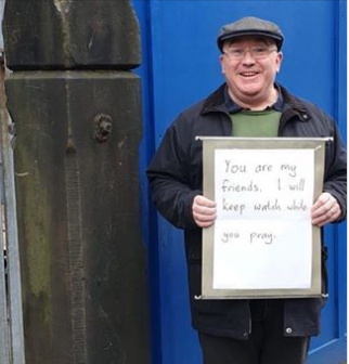 km_caroline's tweet photo. @_SJPeace_ A man outside a Mosque in Manchester, UK today https://t.co/uZ6UBDIDTs