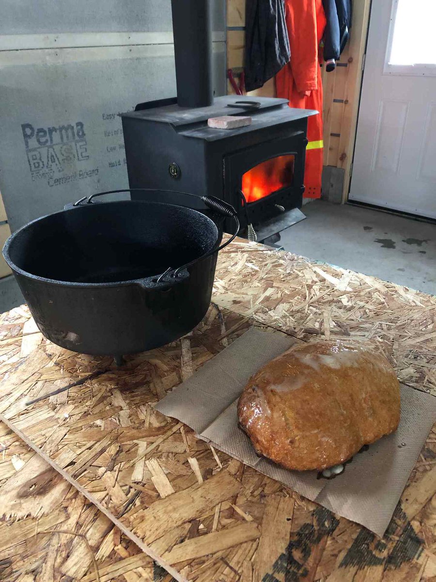 jlancasterCDN's tweet photo. after a few hours fishing on a northern lake, some home made bread, made in a cast iron pot, inside a cast iron wood stove. #luckytobecanadian https://t.co/LBzP09yANL