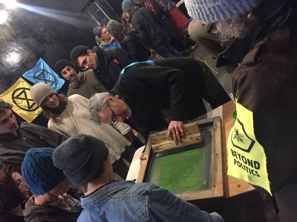 ExtinctionR's tweet image. Rebels Beyond Politics : printing patches in the Arts Factory at the XR #springuprising festival #extinctionrebellion