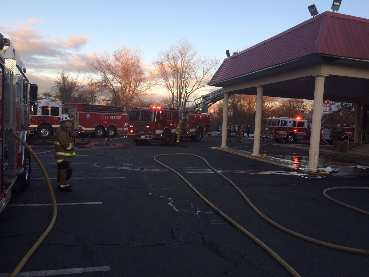 WHPFire's tweet photo. At 06:56 this morning the Warehouse Point and Broad Fire departments were dispatched to the Roadway Inn Hotel for a report of fire coming from roof. Warehouse Point arrived first on scene confirmed the fire on the roof. https://t.co/Xj8Kzg7yoE