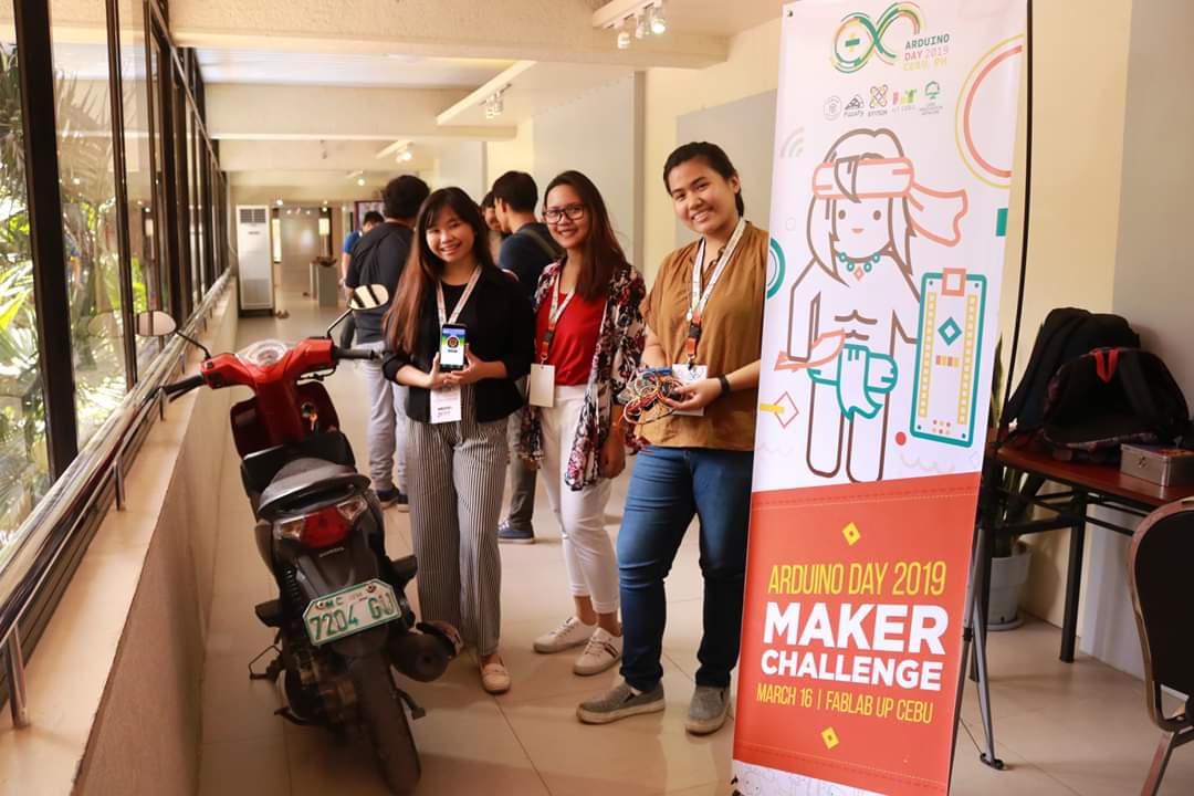 fablabupcebu's tweet photo. LOOK: A motorcycle is up on the 2nd floor. Women TechMakers from GEARZ are leading the way with their Arduino-powered vehicular security system. #AD19CEBU #ArduinoD19 https://t.co/l0mP84N1bq