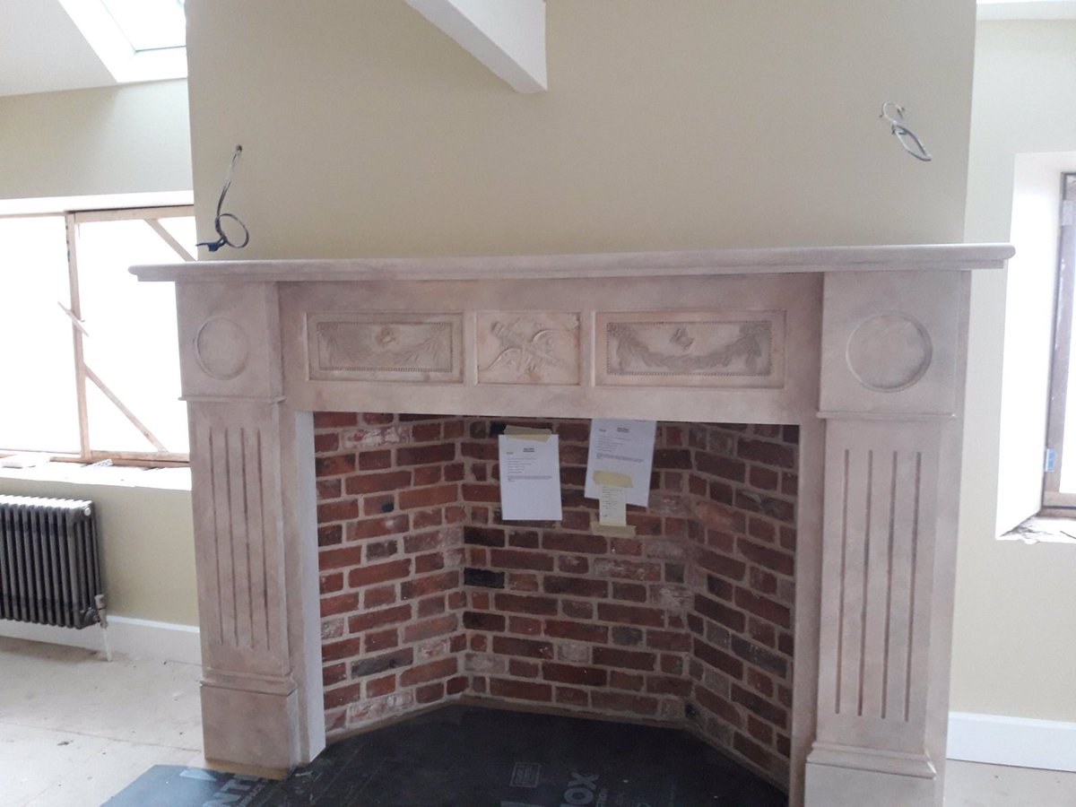 Fire Surround with antique stone panels