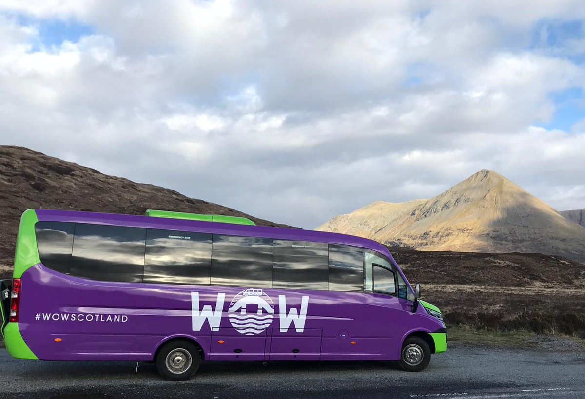 Our photogenic wee bus with Glamaig in the background on our  #Skye #tour #ScotlandIsNow