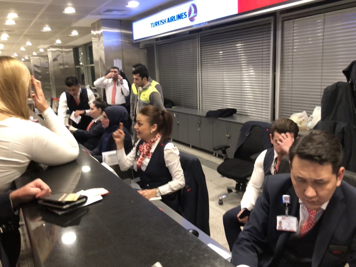 GarryDoctor's tweet photo. #TurkishAirlines Ground Crew in Istanbul are just the worst.  Impolite. No information about layover hotels.  When I started taking pictures of them ignoring customers, they started taking pictures of us.  This is the BUSINESS CLASS DESK! We are Star Alliance Gold Members. https://t.co/PjQCi9p740