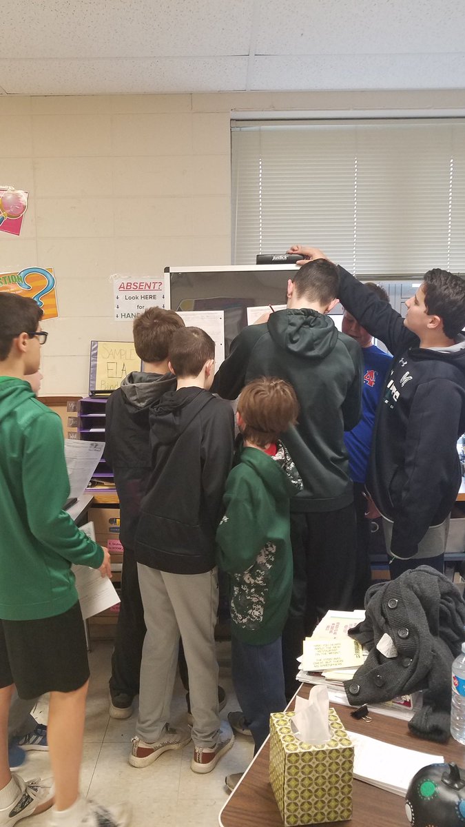 RSkidmoreQMS's tweet photo. What is this shiny new object Ms. Skidmore brought to class today? These boys just HAD to check it out. @BellicoJesse #KeepCalmAndCarryOn #ItsJustABulletinBoard #MrsBellicoIsWorried #QMS225 #QMSGold #QMSRocks https://t.co/PsX2rKdDBP