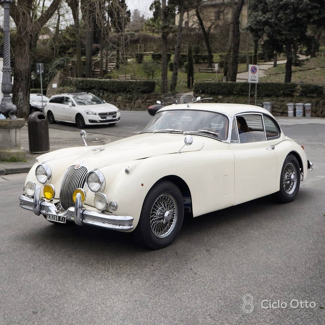 British elegance in a white dress. Jaguar XK150 FHC at the #firenzefiesole historic race in Florence, Italy
#ciclootto #classiccar #vintagecar #petrolhead #Jaguar #jaguarclassic #retrocars #classiccaroftheday #classiccardaily #drivetastefully #carpassion #drivevintage #vintage