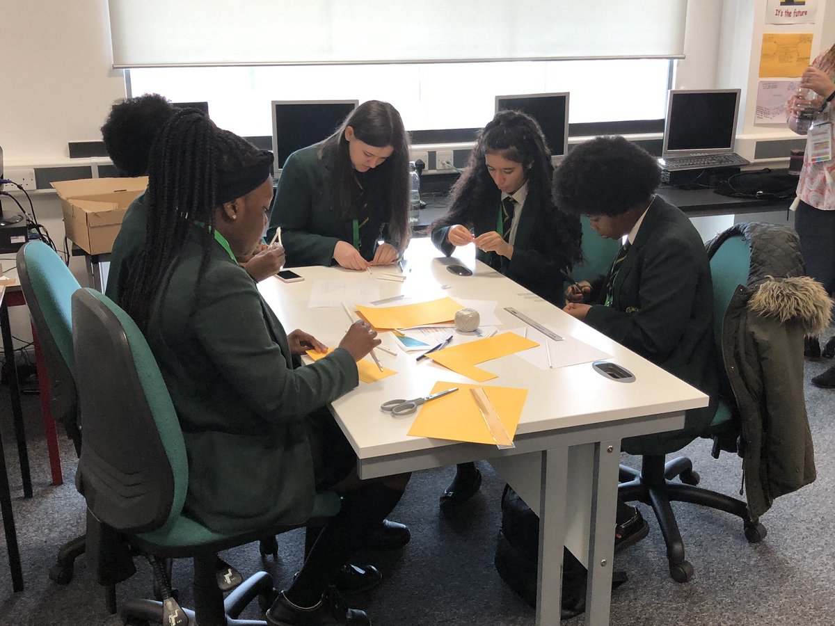 #GirlsIntoEngineering event is looking good. Students solving a bridge challenge and learning about CAD programs.