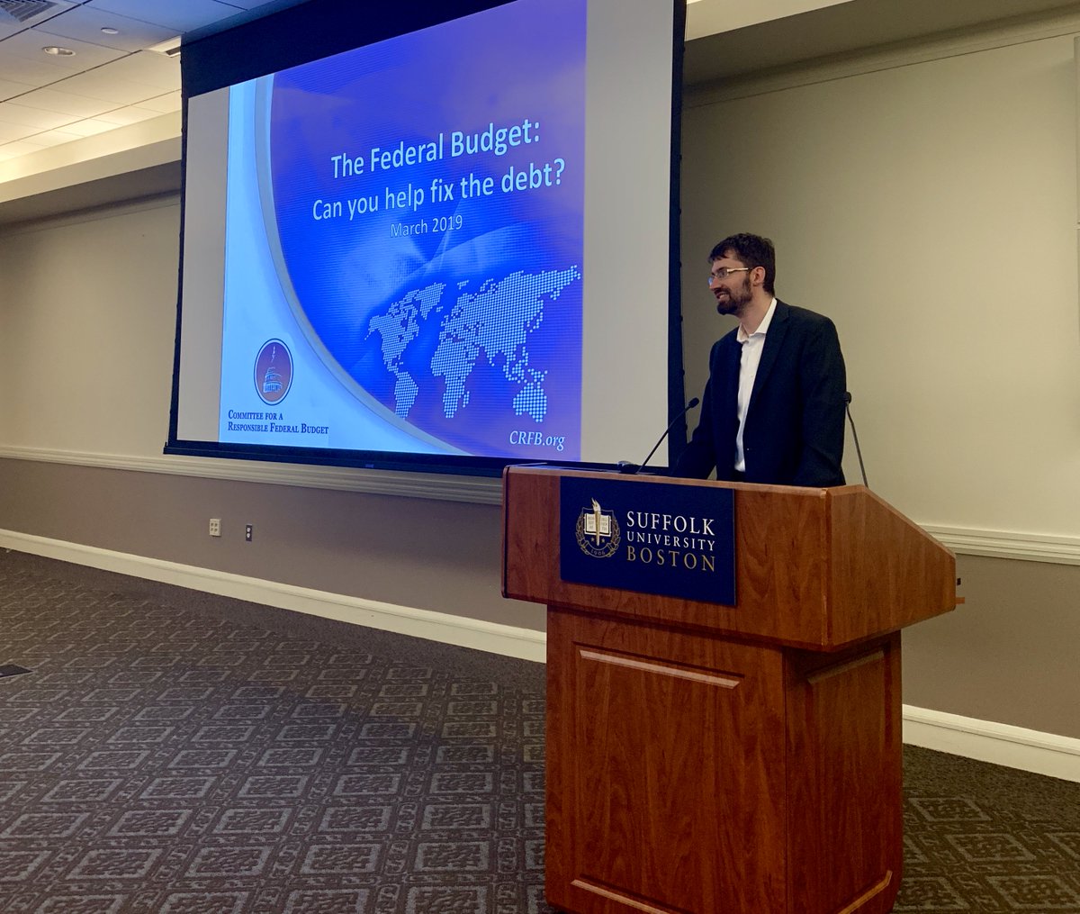 FixtheDebt's tweet photo. .@TylerEvilsizer demonstrates the interactive #DebtFixer tool today at @Suffolk_U. #FixTheDebt https://t.co/BAm36GBfjB https://t.co/DFGfuPQhJ7