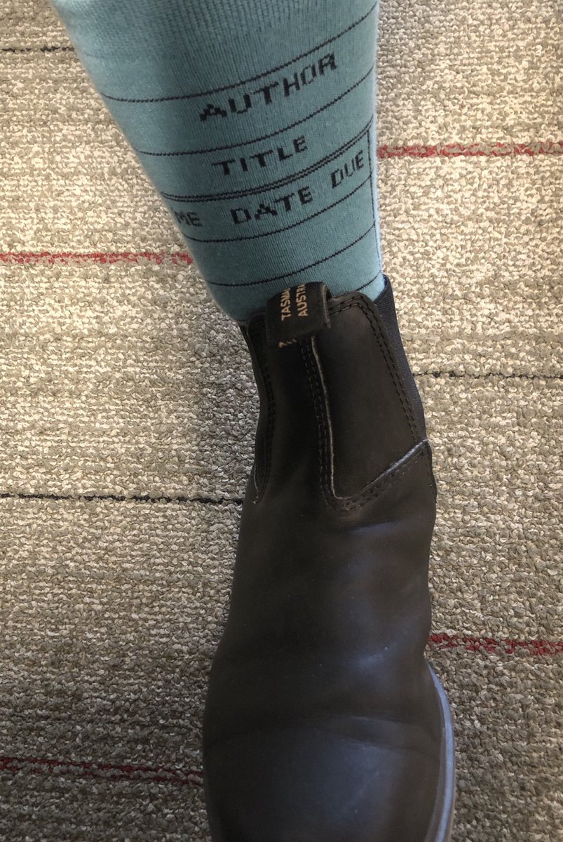 debjeans's tweet image. Wearing the socks today. 😊 #libraryporn #suchanerd #librarybookcard #sockittome @OutofPrintTees @BookmarkHalifax