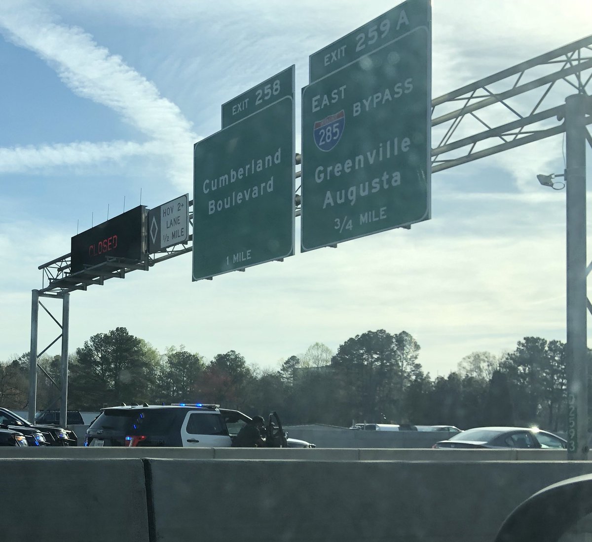 PeterManidis's tweet photo. #Atlanta stay away from #I75 south by 285 - #police have shut down the whole thing, and have #guns drawn on a sedan pulled over https://t.co/MB7P7bhvY3