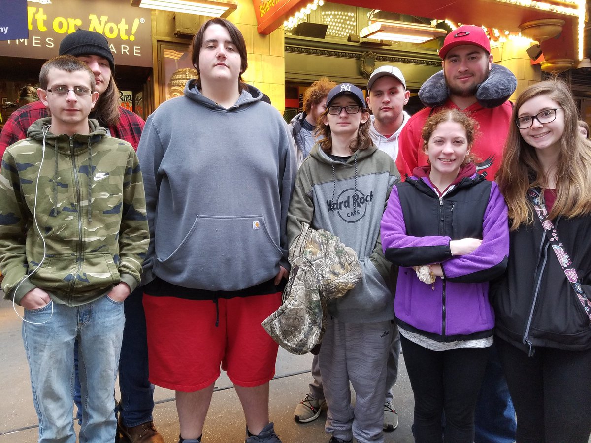 Waiting for Madame Tussauds wax museum on our last day in NYC.