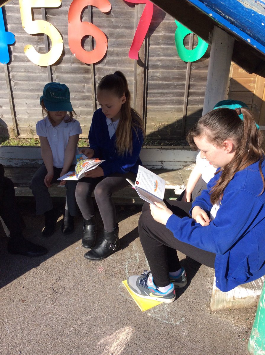 TH_Year6's tweet photo. A lovely day for reading in the sunshine #THlearn6 @THWrens https://t.co/IHuAxcBal0