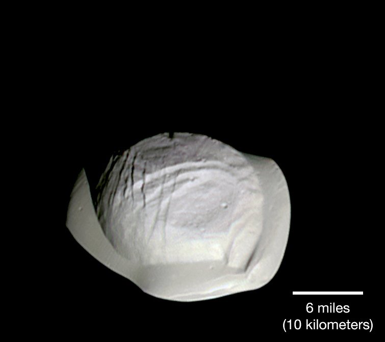 Some of Saturn's moons are shaped like giant ravioli because of a steady rain of dust &amp; ice from the planet's rings. (Or maybe empanadas. Definitely food.) jpl.nasa.gov/news/news.php?…