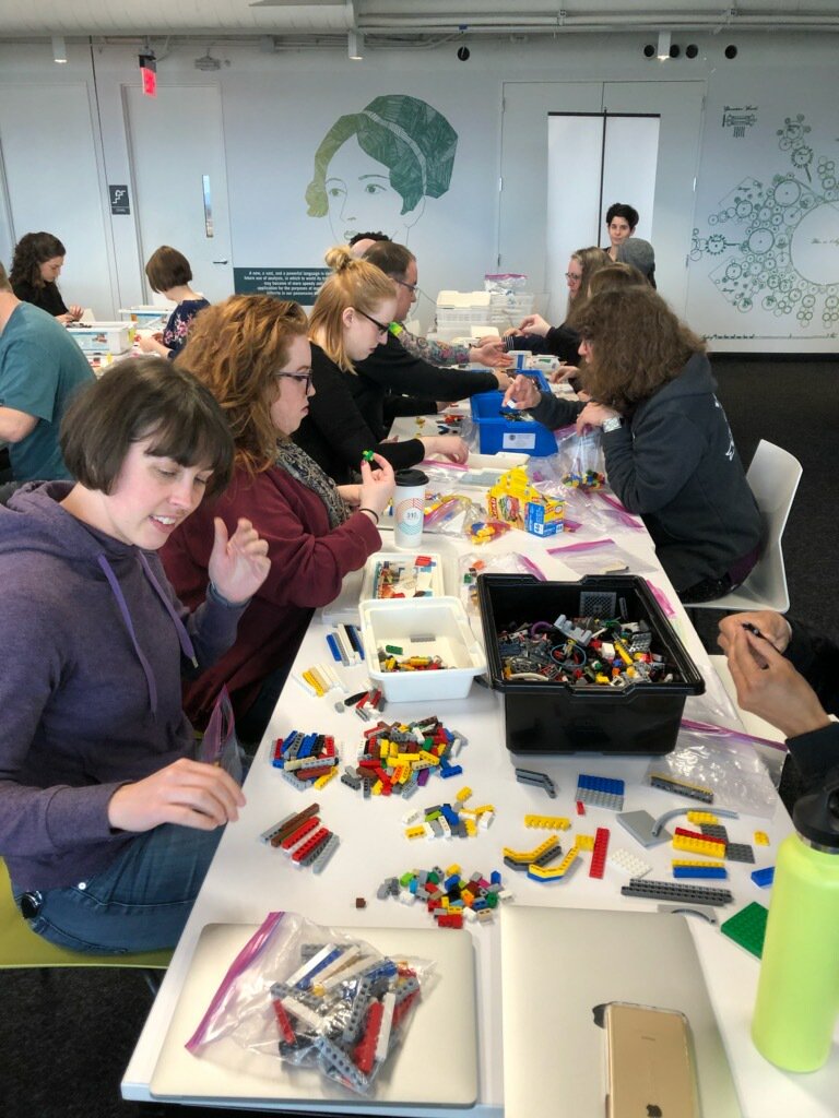 saturdayacademy's tweet photo. What an incredible turnout yesterday! A BIG thank you to @newrelic for volunteering your time with us! Four huge bins were sorted meticulously, brick by tiny brick. Thank you again for your dedication and support, we couldn't have done this without volunteers like you! #LEGOSort https://t.co/SbfqWqfokl