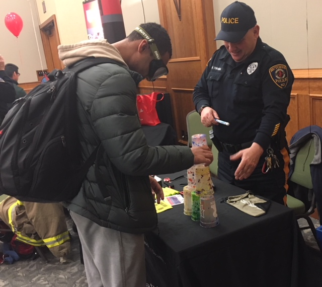 Rutgers_PD's tweet photo. Members of the #RutgersPD and #RutgersEmergencyServices attended the annual Health Resource Fair in Camden. Attendees received informational materials and participated in interactive activities including our cup stacking challenge while wearing impairment goggles! @Rutgers_IPO https://t.co/vsWMbGimL6