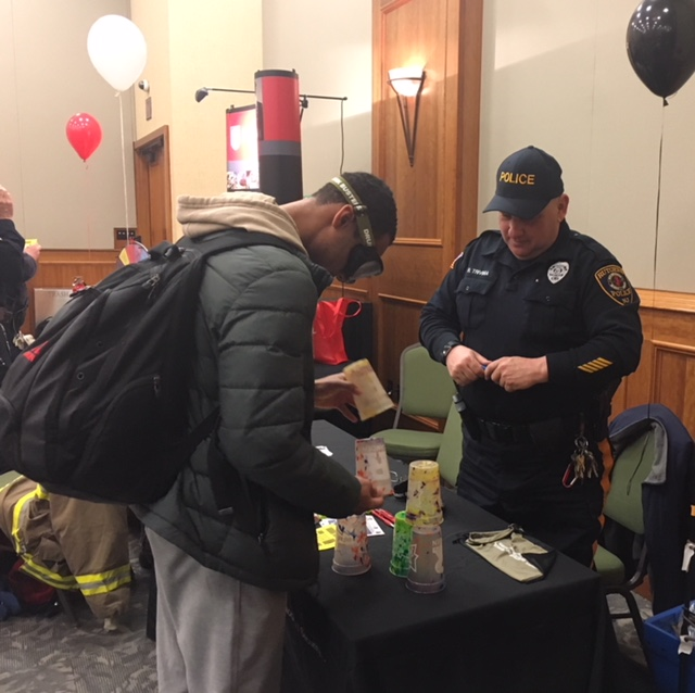 Rutgers_PD's tweet photo. Members of the #RutgersPD and #RutgersEmergencyServices attended the annual Health Resource Fair in Camden. Attendees received informational materials and participated in interactive activities including our cup stacking challenge while wearing impairment goggles! @Rutgers_IPO https://t.co/vsWMbGimL6