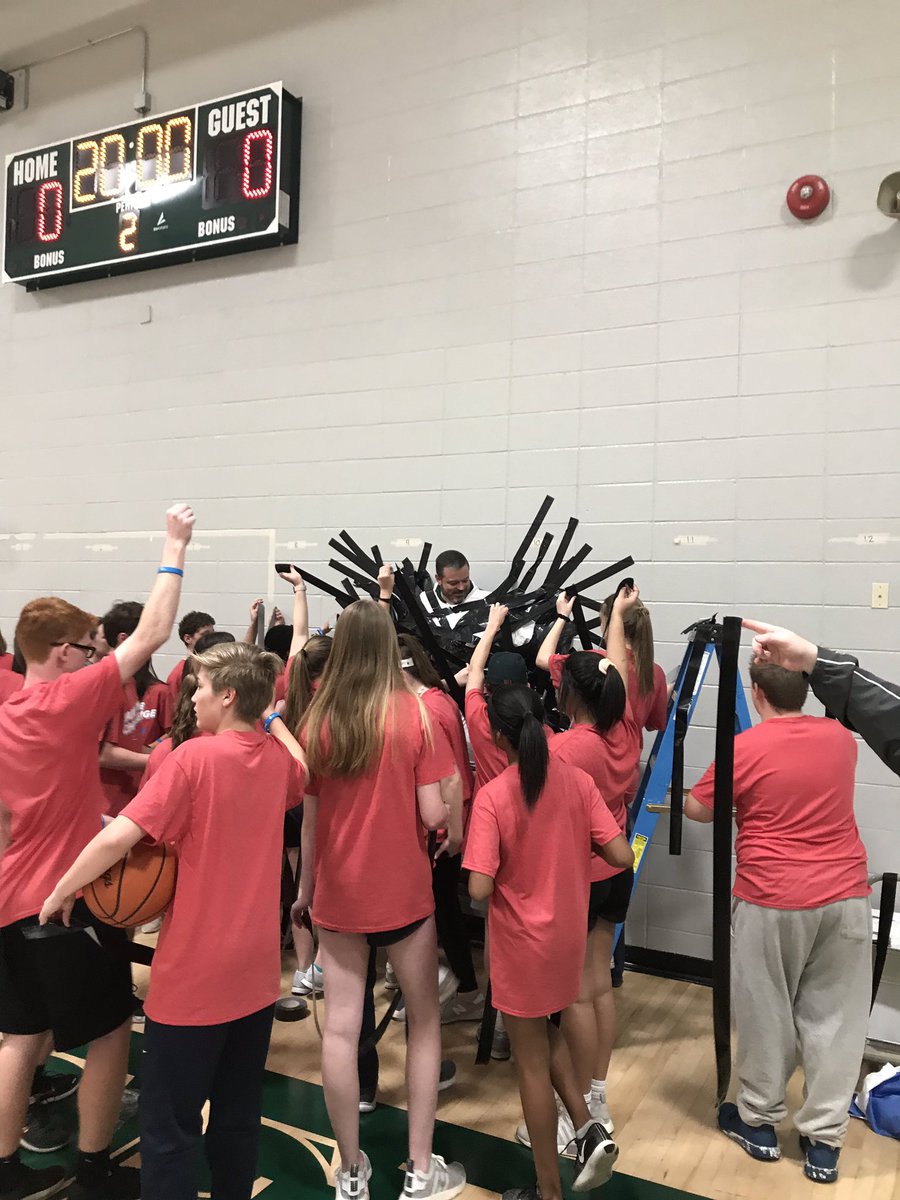 DCMSperks's tweet photo. When you raise enough money to tape your principal to the wall @DrakesCreekMS #hoopsforheart https://t.co/lFbtKrS3V2