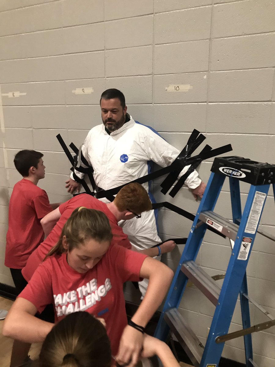 DCMSperks's tweet photo. When you raise enough money to tape your principal to the wall @DrakesCreekMS #hoopsforheart https://t.co/lFbtKrS3V2