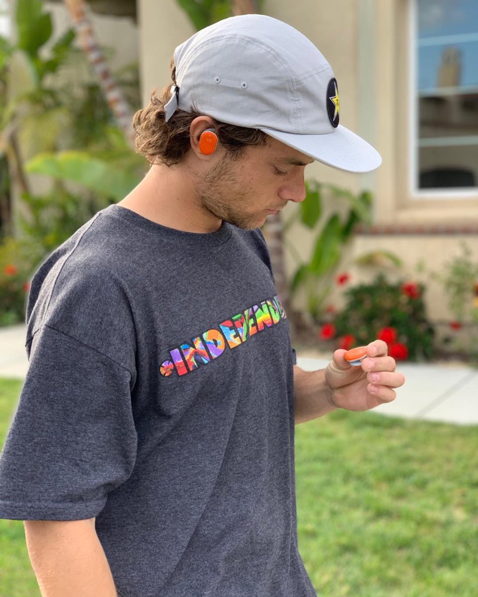 skullcandy's tweet photo. Subtle yet vivid. @chrisjoslin_ taking the Push in Bold Tangerine for a test drive. #feelskullcandy #feelbold https://t.co/IcA3K3OqAW
