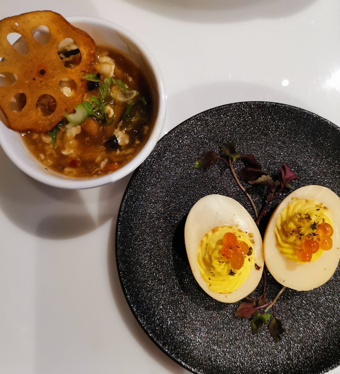 JimHarris's tweet photo. Deviled Eggs and Veg Hot and Sour Soup Appetizer At Pop Up Restaurant Luke by @cheftoben at @gracevenueTO #Toronto #popuprestaurant #foodie #food #TorontoEats #asiancuisine https://t.co/IkYV5Niyo5