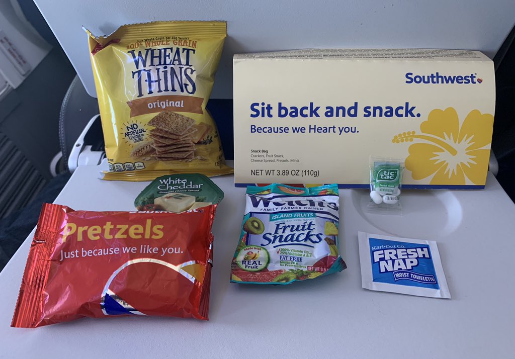 JosephJLei's tweet photo. Onboard 5665 enroute to HNL.. Sneak peek at @SouthwestAir snack service #1. We ❤️ you too, thanks for the cutest mini bag of tic tacs I've ever seen... I can't even RN #SouthwestSaysAloha https://t.co/IH9SZyH8JY